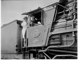 21 February 1947. SAR Class 15F No 3030 with driver Mr Kruger and locomotive inspector.
