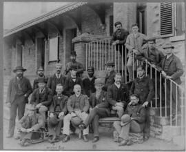 Grahamstown, 1897. Stationmaster William McClorg and staff at railway station.