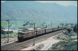 De Doorns district, 1981. SAR Class 5E1 Srs 1 on train 202up 'Trans-Karoo' passenger train at San...