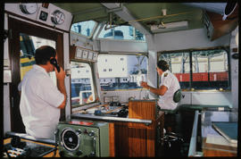 Port Elizabeth, March 1986. Crew at the controls of a tug. [T Robberts]