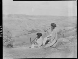 Transkei, 1954. Two women smoking pipes.