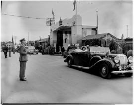 Port Elizabeth, 26 February 1947. Royal family departs from station in open Daimler.