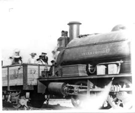 Open wagon with passengers hauled by "Nylstroom" locomotive on the Pretoria - Pietersbu...