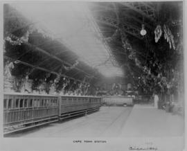 Cape Town, 1903. Inside of station with passenger train at platform.