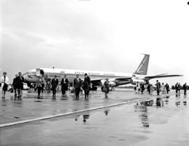 Cape Town, 1966. DF Malan airport. SAA Boeing 707 ZS-CKD 'Cape Town, passengers disembarking on w...