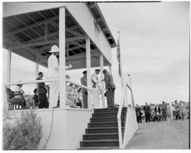 Lobatsi, Bechuanaland, 17 April 1947. King George VI greeting man on dais.