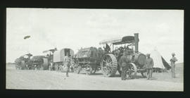Three Fowler oil tractors with trailers.