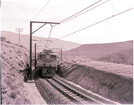 De Doorns district, 1962. SAR Class 4E No E231 with goods train near Osplaas.