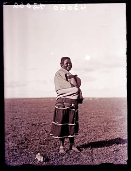 King William's Town district, 1935. Elderly Fingo woman standing.