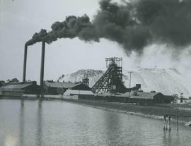 Johannesburg, 1935. Gold mine with dump in background.
