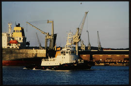 Durban, 1990. SAR tug 'Coenie de Villeirs' in Durban Harbour.