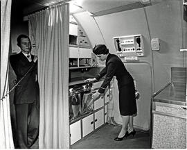 
SAA Boeing 707 ZS-CKC interior. Galley. Hostess and steward.
