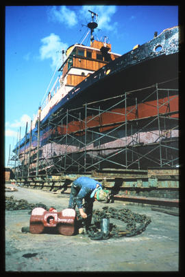 Port Elizabeth, October 1975. Ship being painted in Port Elizabeth Harbour. [JV Gilroy]