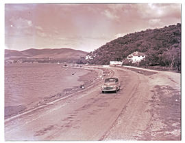 "Knysna, 1949. Road alongside lagoon."