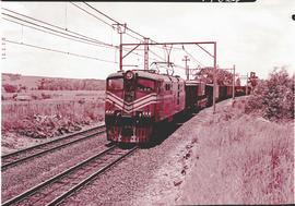 Johannesburg, 1978. SAR 5E1 No 937 near Lawley with goods train.