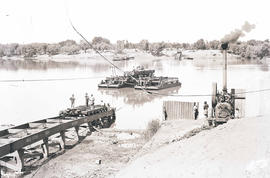 Upington, February 1915. Moving rail material over Orange River by pontoon during World War One.