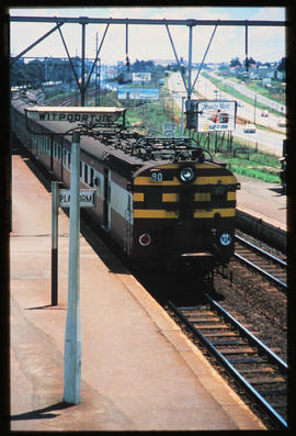 Johannesburg, 1973. SAR Class 5M2A EMU on suburban train No 90 at Witpoortjie station platform. [...