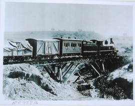 Brounger Collection No 12. Locomotive 235 (?) with mixed train on trestle bridge.