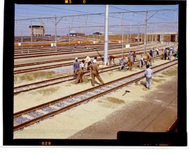 Bapsfontein, December 1982. Workers ballasting the lines at Sentrarand. [T Robberts]