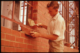 Apprentice bricklayer.