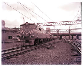 "Johannesburg, 1965. Two SAR Class ? With Blue Train leaving."