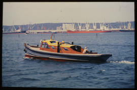 Durban, September 1984. Small boat in Durban Harbour. [T Robberts]