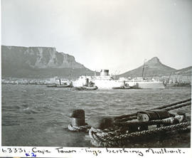 Cape Town, 1955. Three tugs berthing mailboat.