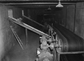 Johannesburg, August 1952. Conveyor belt and chutes in postal tunnel.