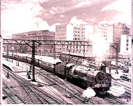 Johannesburg, 1949. SAR Class 15F with Blue Train leaving.