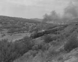 Mossel Bay district, 1963. Passenger train leaving Grootbrakrivier.
