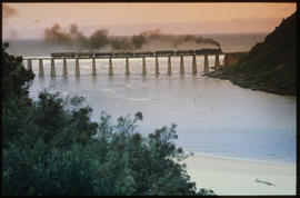 Wilderness district, February 1987. Mixed train on Kaaimansrivier bridge. [T Robberts]