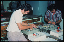 
Electronic technicians at work.
