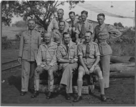 Barberton, January 1941. Group of nine officers next to railway line.