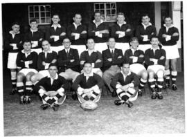 Rugby team with ball marked "Holzers Pretoria".