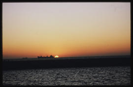 Port Elizabeth, August 1983. Sunset in Port Elizabeth Harbour. [T Robberts]