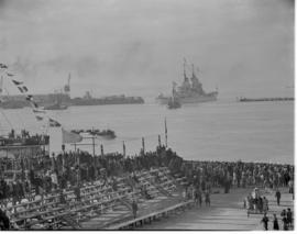 Cape Town, 24 April 1947. 'HMS Vanguard' and SAR tug 'John X Merriman' leaving Table Bay Harbour.