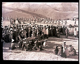 Transkei, 1932. Abakweta dance being watched by crowd.