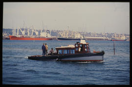 Durban, September 1984. Small boat in Durban Harbour. [T Robberts]