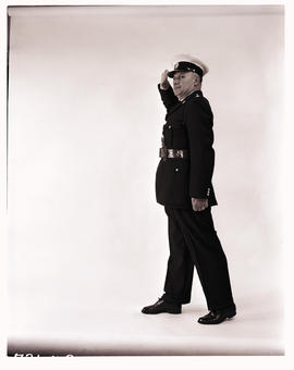 
SAR. Police officer showing uniform.
