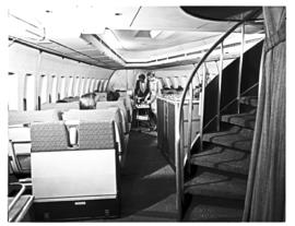 
SAA Boeing 747 interior. Cabin service. Steward and hostess.
