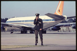 SAA Boeing 707 ZS-S?? On tarmac with SAR policeman.