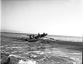 Port Elizabeth, 1968. Lifesavers rowing in the surf.