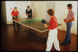 October 1985. Four persons playing table tennis. [T Robberts]