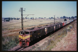 Circa 1972. Four SAR Class 6E1 Srs 3's, No E1353 leading, with container train.