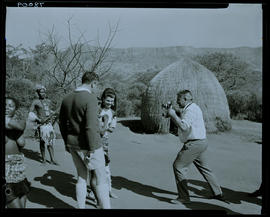 Natal, 1968. Zulu women showing off her beads to visitors.