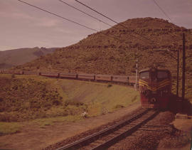 De Doorns district, 1962. Trans Karoo passenger train at Osplaas.