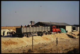 Brandfort district, 1984. Loading salt onto SAR truck. [T Robberts]