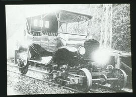 Motor car modified to railway inspection vehicle.