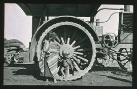 SAR Marshall Colonial Type F tractor with woman standing next to rear wheel and little child stan...