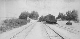 Lady Grey Bridge (later Huguenot), 1895. Cape 3rd Class Dubs on train with station in the distanc...